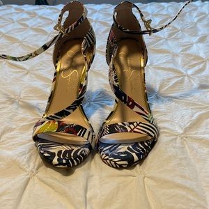 Multicolored, sandal heel with strap across and buckle closure at ankle.